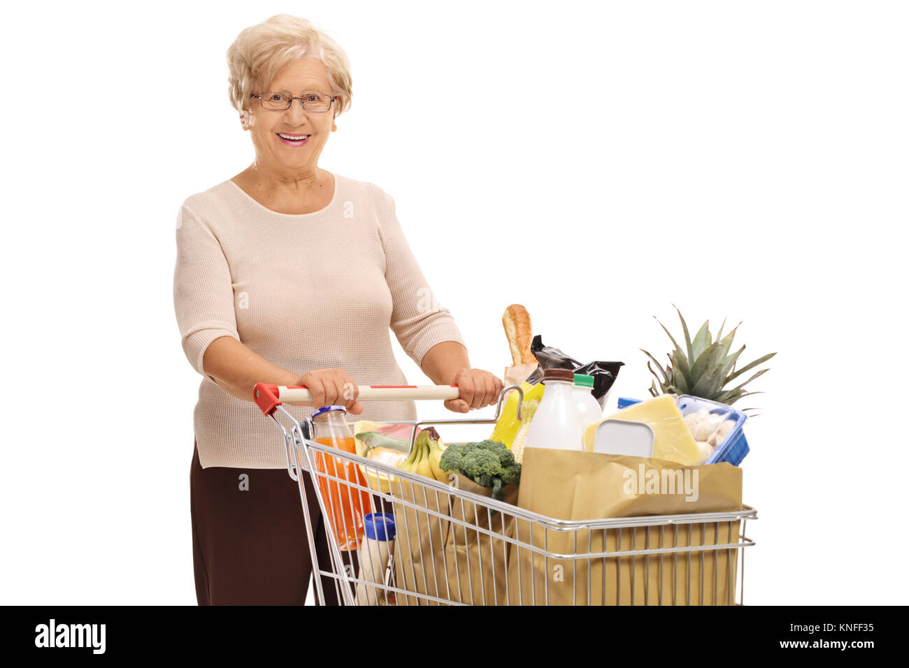 Old lady shopping trolley hi-res stock photography and images - Alamy