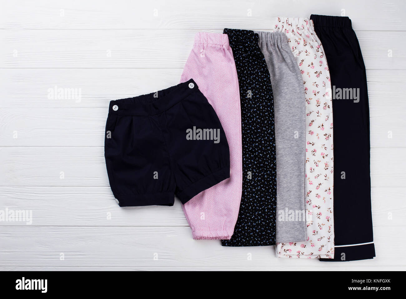 Pajama bottoms on white table Stock Photo