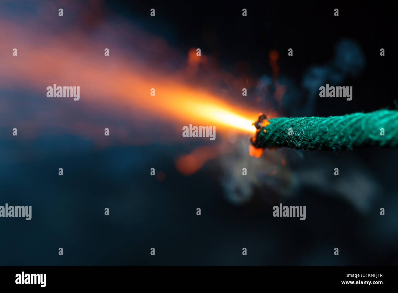 Burning fuse with sparks on black background Stock Photo Alamy