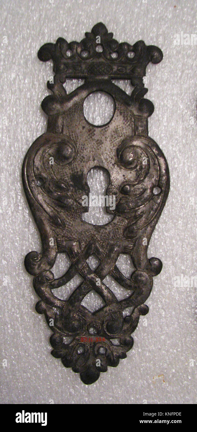 Escutcheon of lock MET SF87 11 334 186907 French or Flemish, Escutcheon of lock, 17th century, Iron, 6 5/8 x 2 3/4 in.  (16.8 x 7.0 cm). The Metropolitan Museum of Art, New York. Gift of Henry G. Marquand, 1887 (87.11.334) Stock Photo