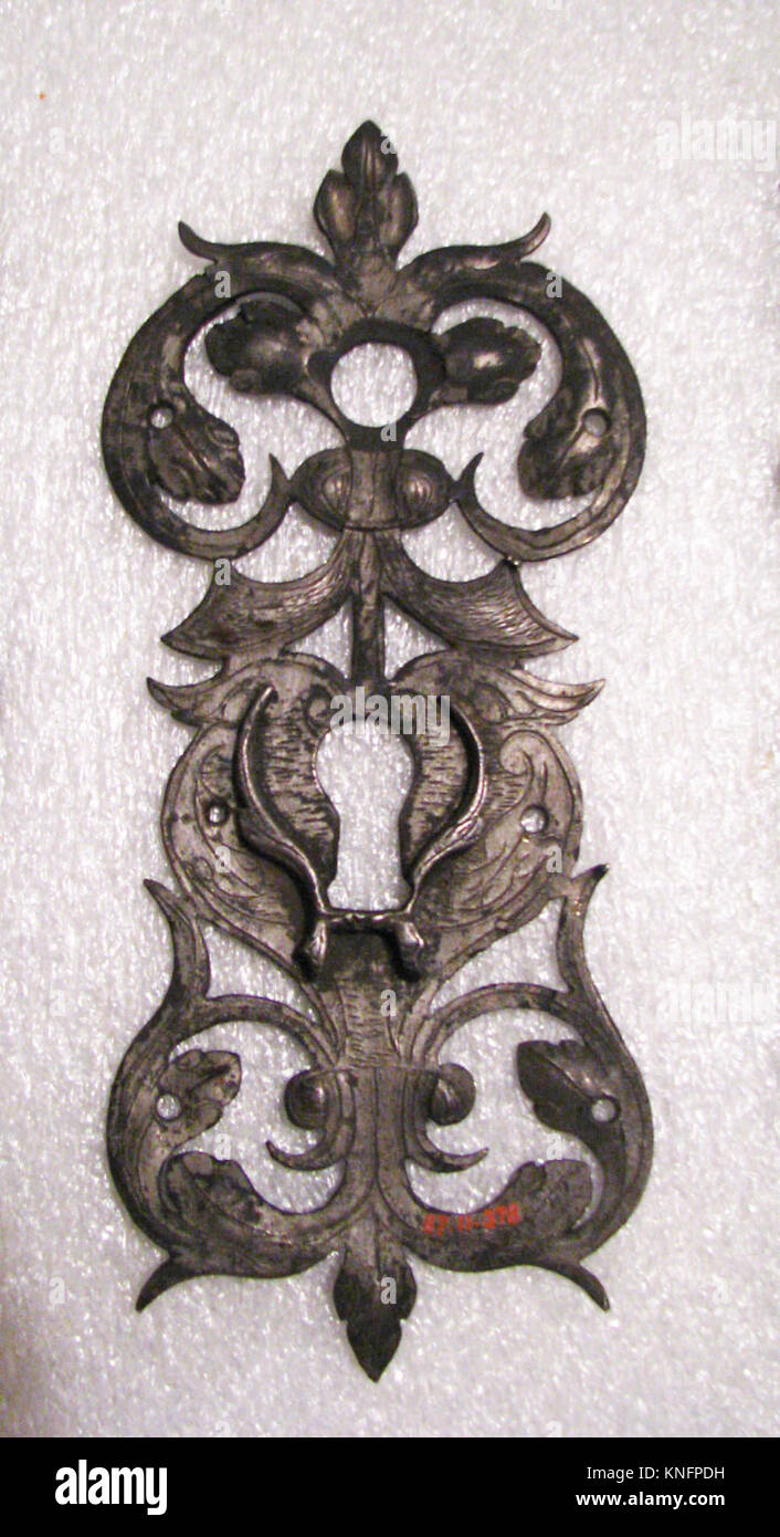 Escutcheon of lock MET SF87 11 378 186928 German, Escutcheon of lock, 1561?1620, Iron, 6 1/2 x 2 3/4 in.  (16.5 x 7 cm). The Metropolitan Museum of Art, New York. Gift of Henry G. Marquand, 1887 (87.11.378) Stock Photo