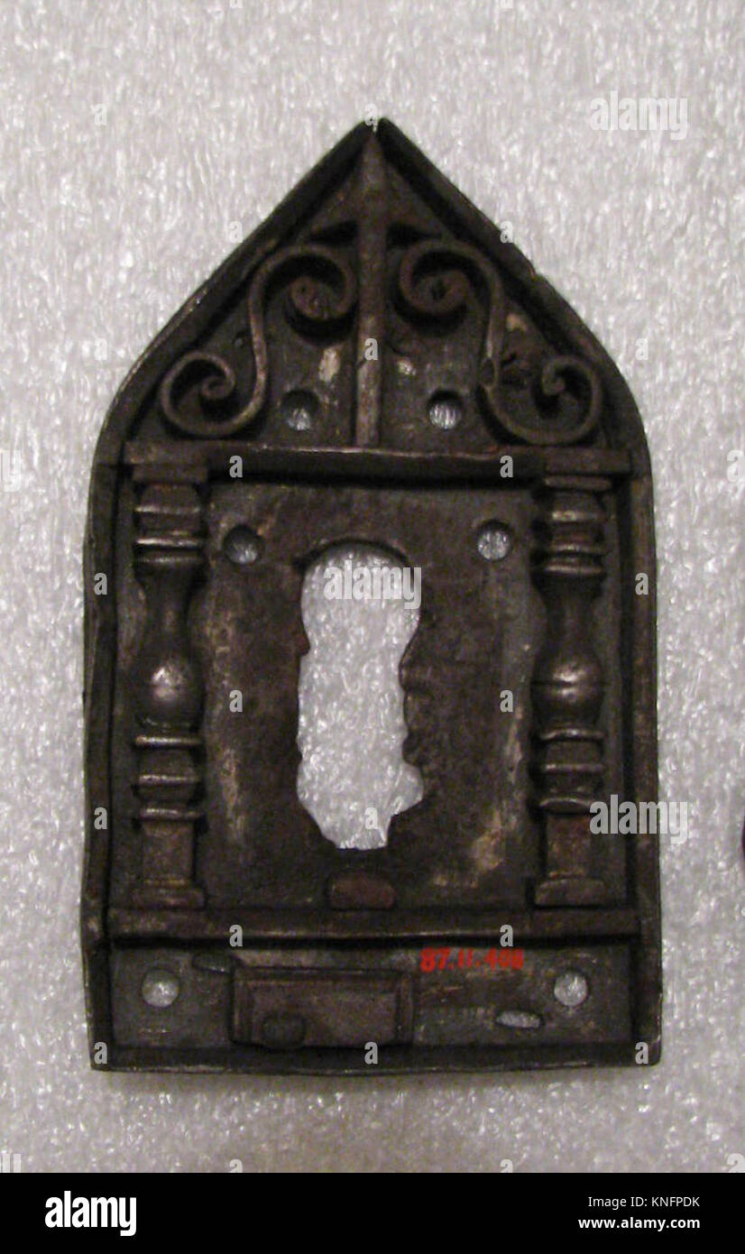 Escutcheon of lock MET SF87 11 408 186940 German, Escutcheon of lock, 1590?1620, Iron, 3 3/4 x 2 1/4 in.  (9.5 x 5.7 cm). The Metropolitan Museum of Art, New York. Gift of Henry G. Marquand, 1887 (87.11.408) Stock Photo