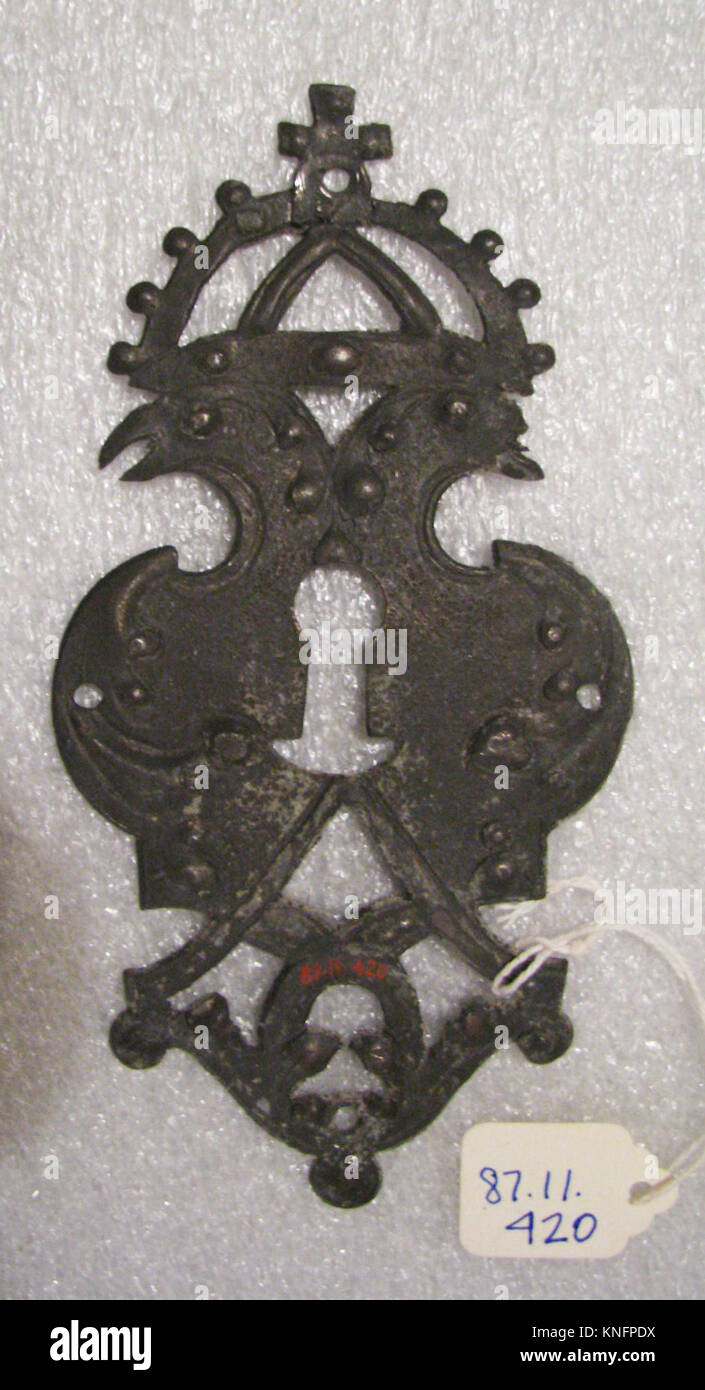 Escutcheon of lock MET SF87 11 420 186941 German, Escutcheon of lock, first half 17th century, Iron, 5 1/2 x 2 3/4 in.  (14 x 7 cm). The Metropolitan Museum of Art, New York. Gift of Henry G. Marquand, 1887 (87.11.420) Stock Photo