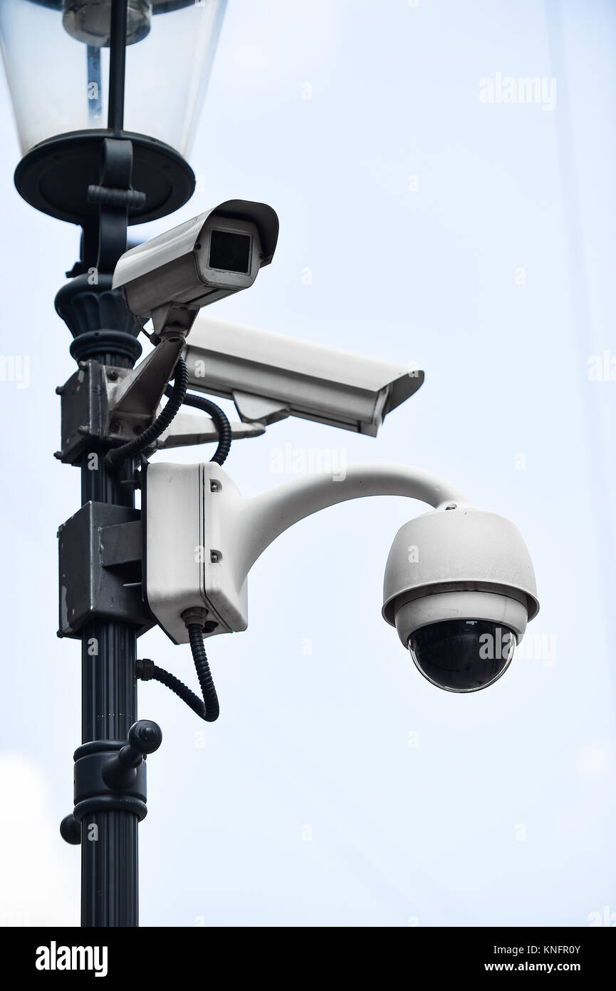Video surveillance camera on a lighting pole Stock Photo Alamy
