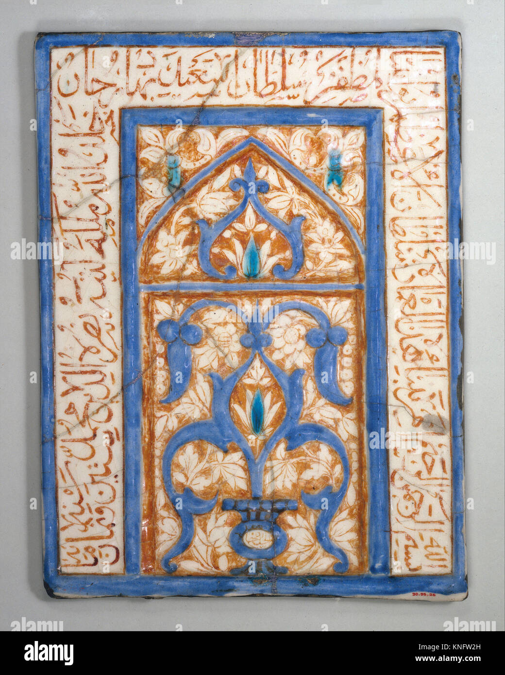 Tile with Niche Design. Calligrapher: Nusrat al-Din Muhammad; Object Name: Tile with niche design; Date: dated A.H. 860/A.D. 1455-56; Geography: Stock Photo