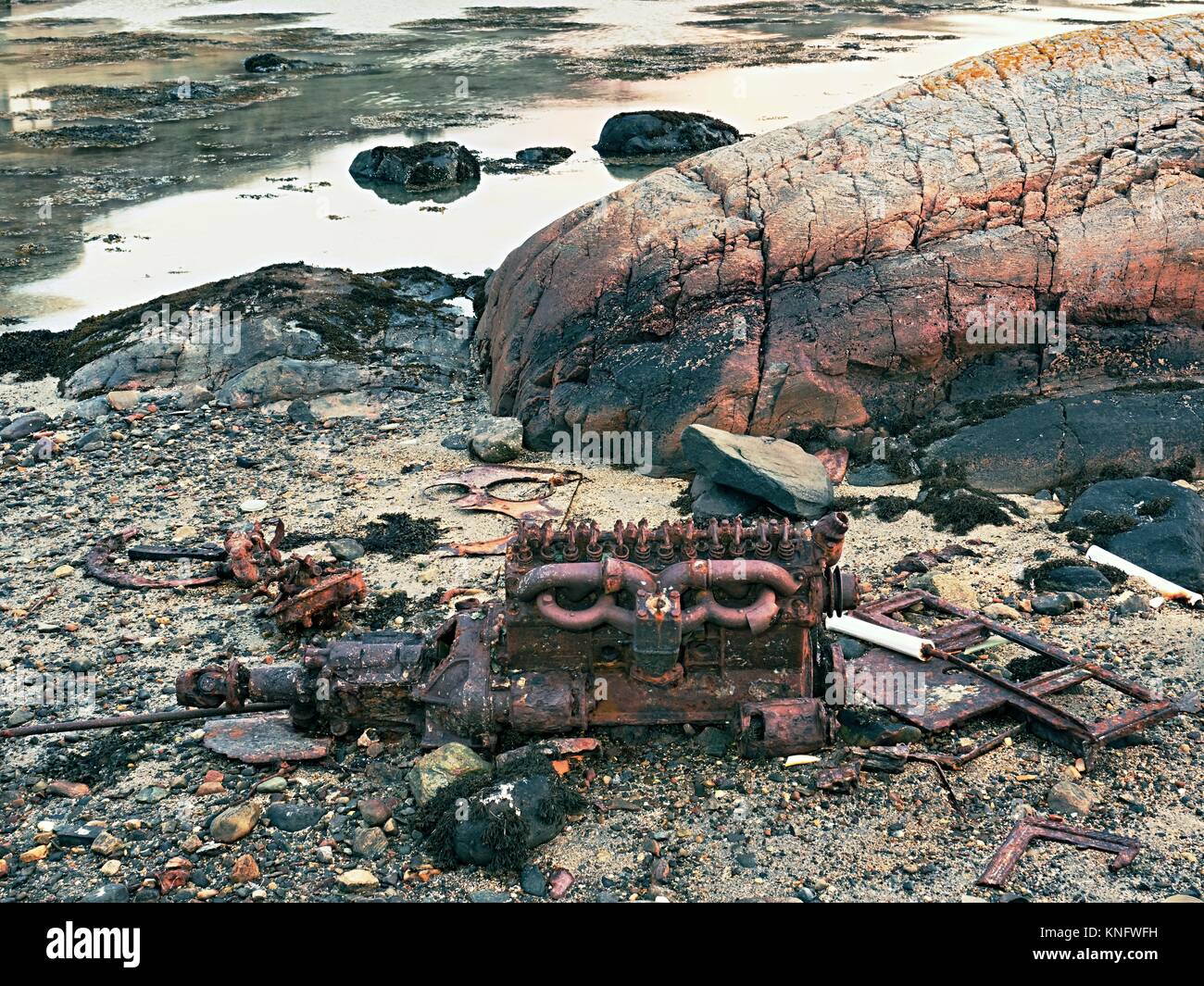 Rest of engine block of sunken boat. Abandoned motor of Shipwreck at