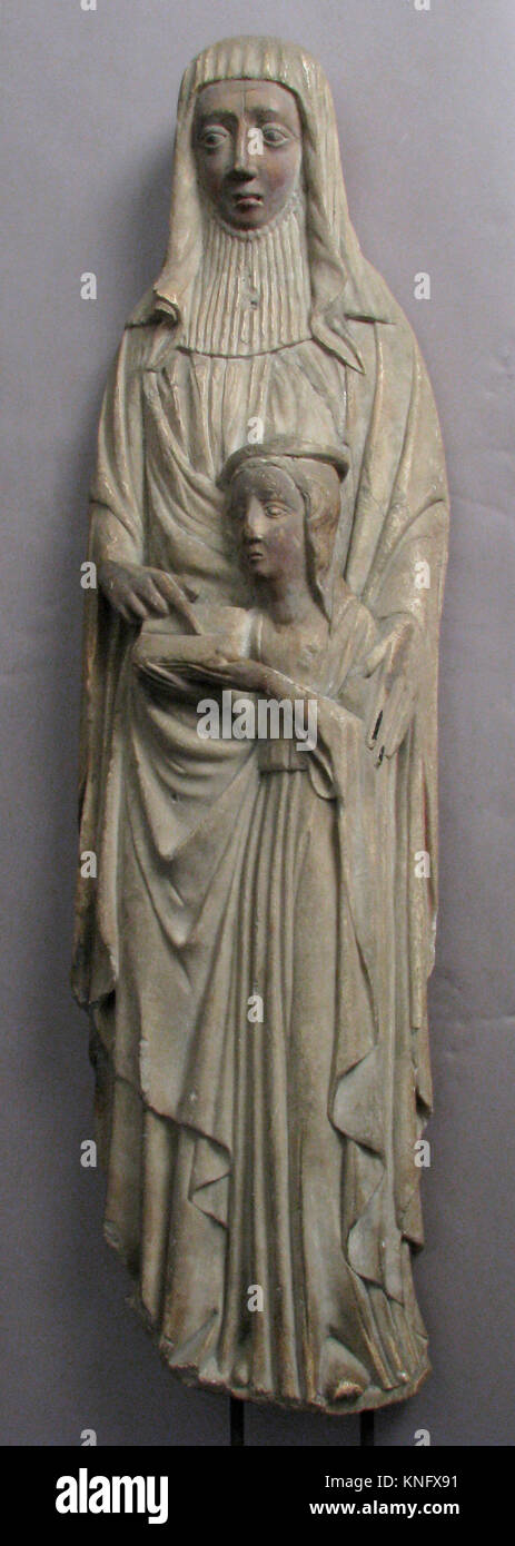 Education of the Virgin by Saint Anne. Date: 15th century; Culture: Spanish; Medium: Alabaster, paint; Dimensions: Overall: 31 1/8 x 8 1/2 x 4 1/8 Stock Photo