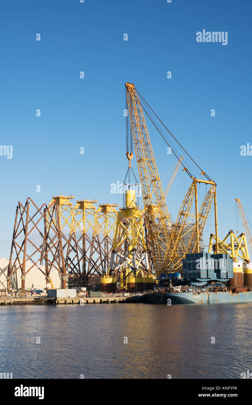 Sarens giant crane lifts offshore wind turbine support at Smulders Hadrian Yard on the Tyne, Wallsend, north east England, UK Stock Photo
