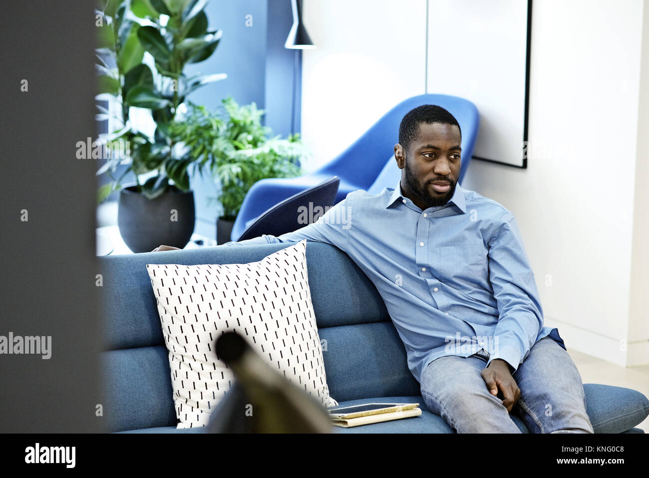 Black male creative professional in a creative agency Stock Photo
