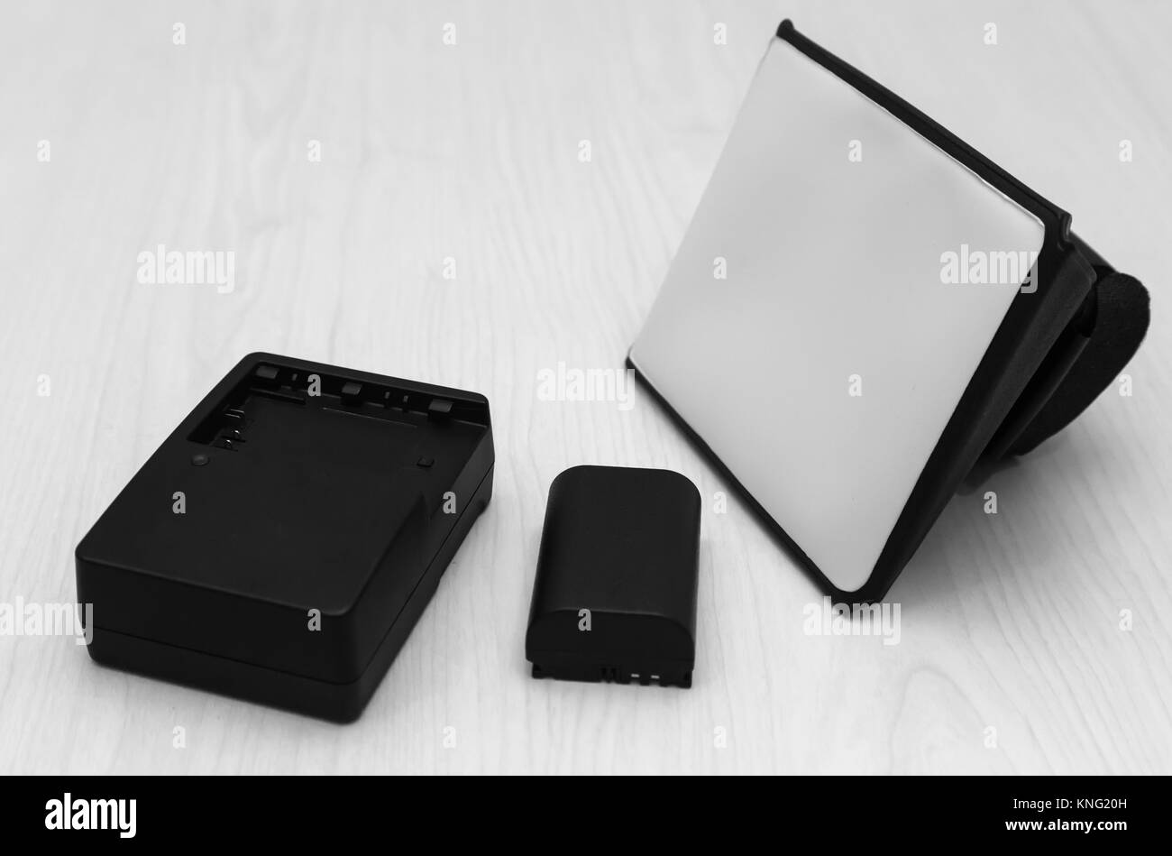 Accessories for the camera battery, charger, flash light for flashes