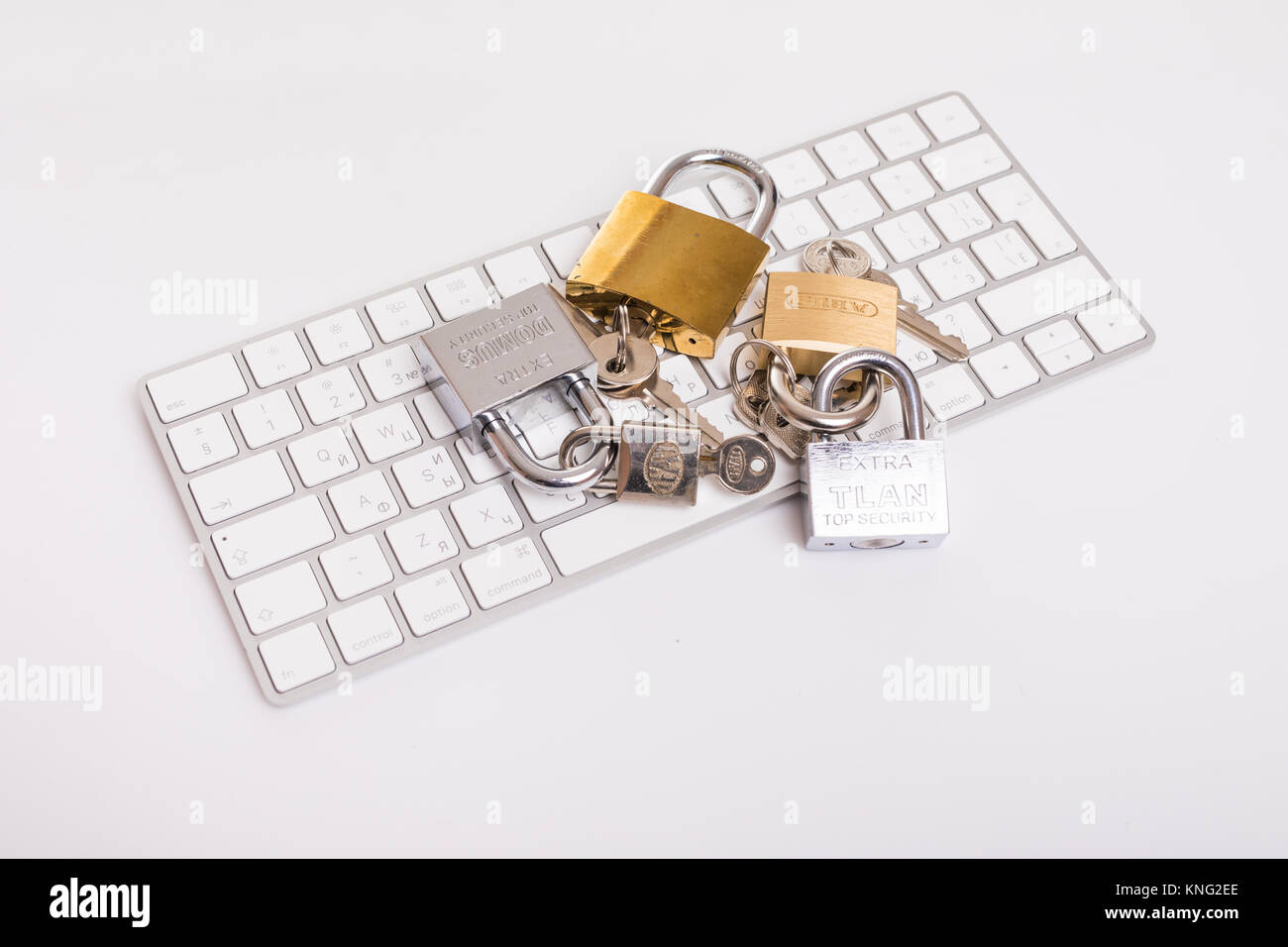 Locked laptop with locks on keyboard isolated with white background