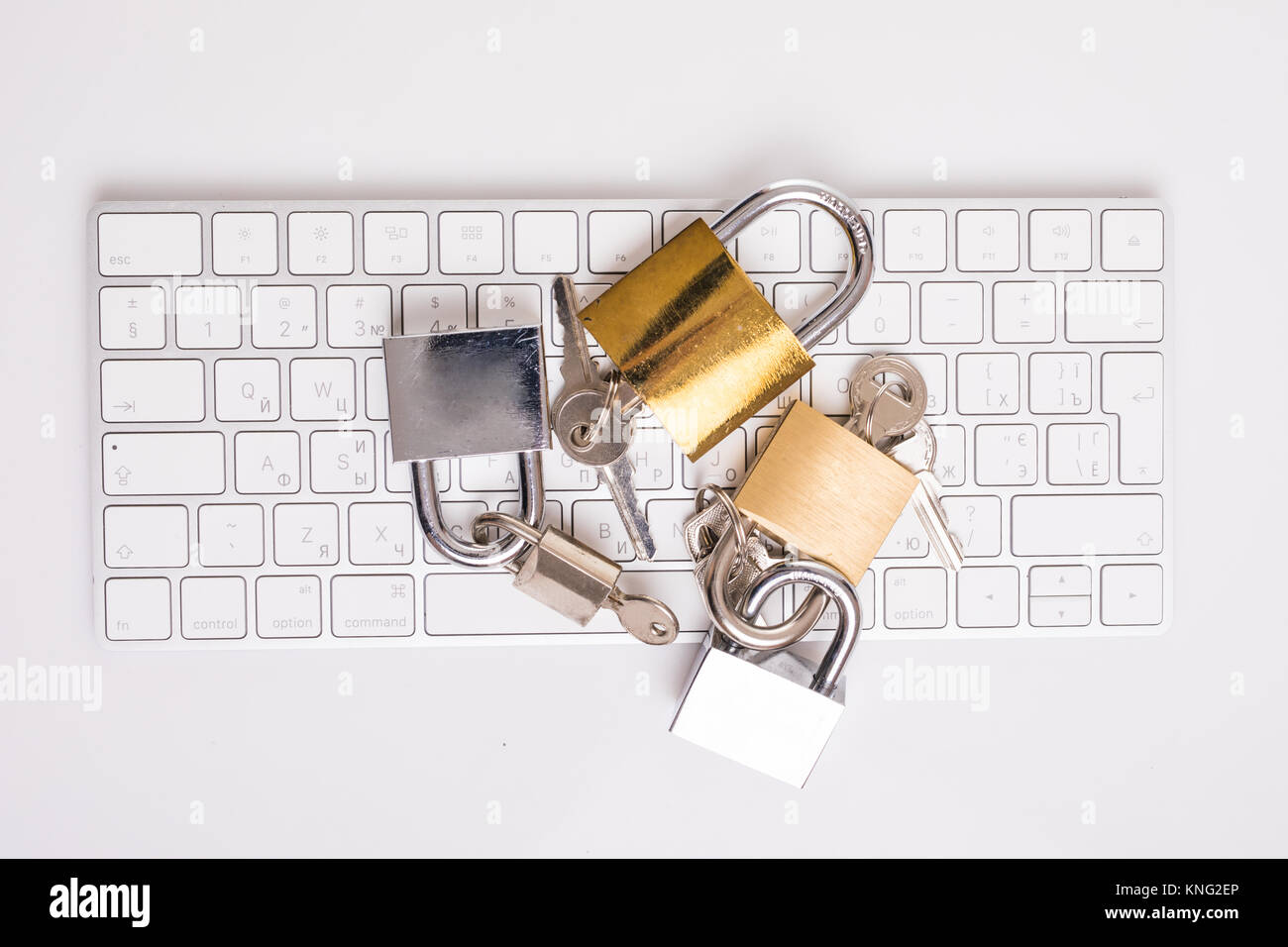 Locked laptop with locks on keyboard isolated with white background