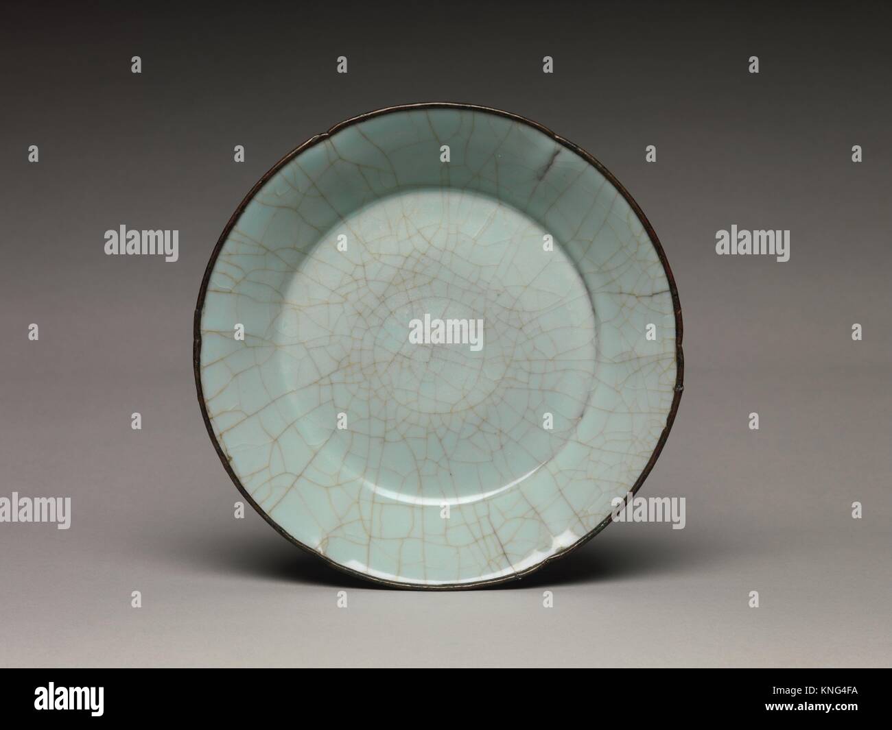 Dish. Period: Southern Song dynasty (1127-1279); Date: late 12th-13th century; Culture: China; Medium: Stoneware with crackled blue glaze (Guan Stock Photo