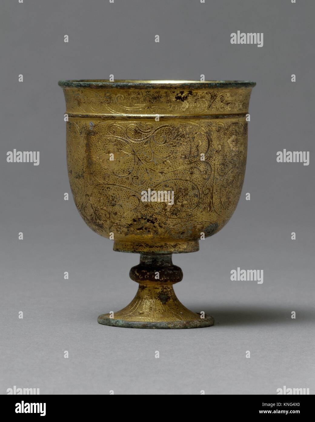 Stem Cup. Period: Tang dynasty (618-907); Date: late 7th-early 8th century; Culture: China; Medium: Cast bronze with gilding and traced and punched Stock Photo