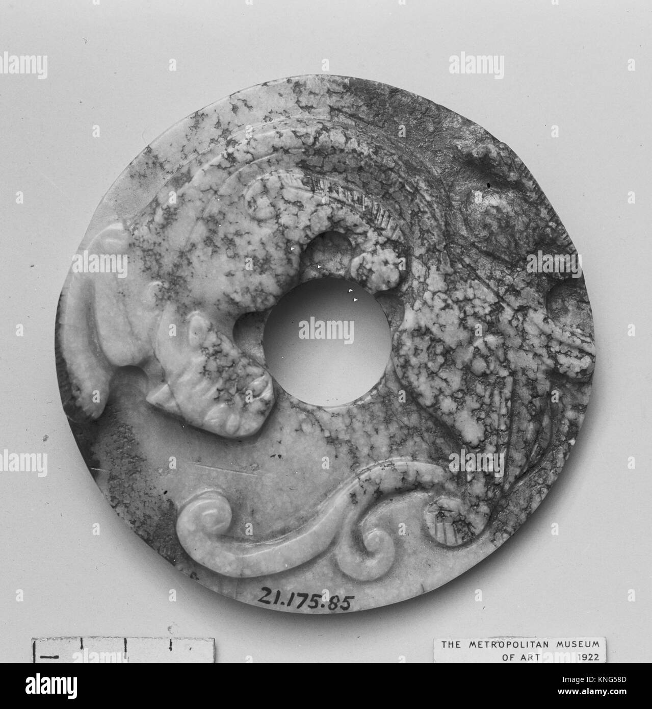Disk. Period: Han dynasty (206 B.C.-A.D. 220); Culture: China; Medium: Nephrite; Dimensions: Diam. 3 in. (7.6 cm); Classification: Jade Stock Photo