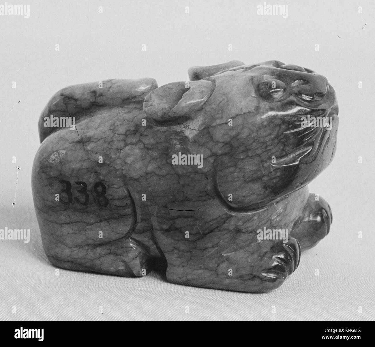 Girdle appendage. Date: ca. 13th century; Culture: China; Medium: Nephrite; Dimensions: H. 2 in. (5.1 cm); W. 1 5/16 in. (3.4 cm); L. 1 1/4 in. (3.1 Stock Photo