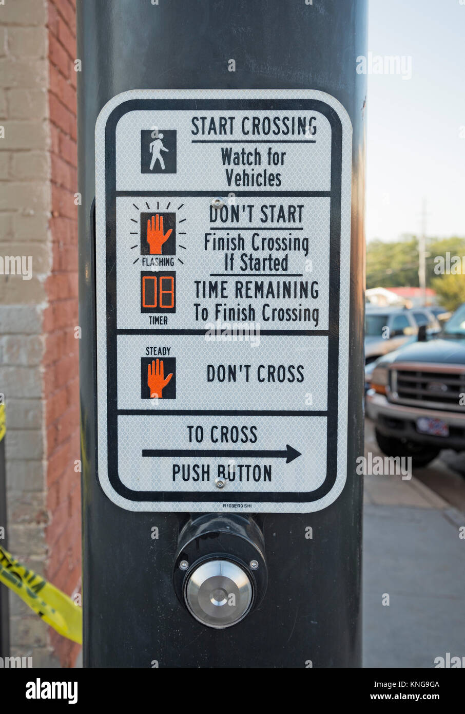 Electronic pushbutton crosswalk safety and assistance in a small Georgia downtown area. Stock Photo