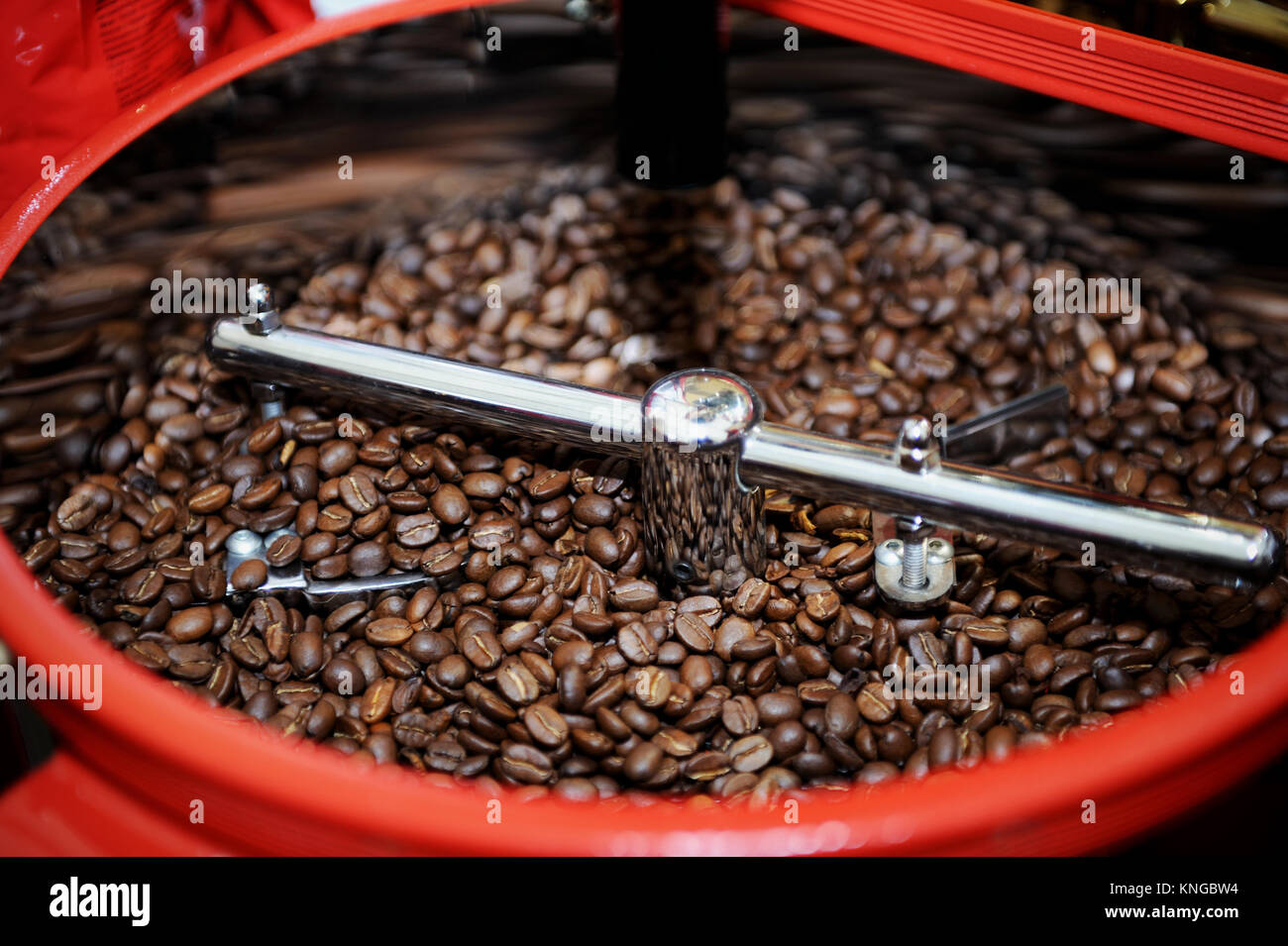 Freshly roasted coffee beans in a coffee roaster Stock Photo Alamy