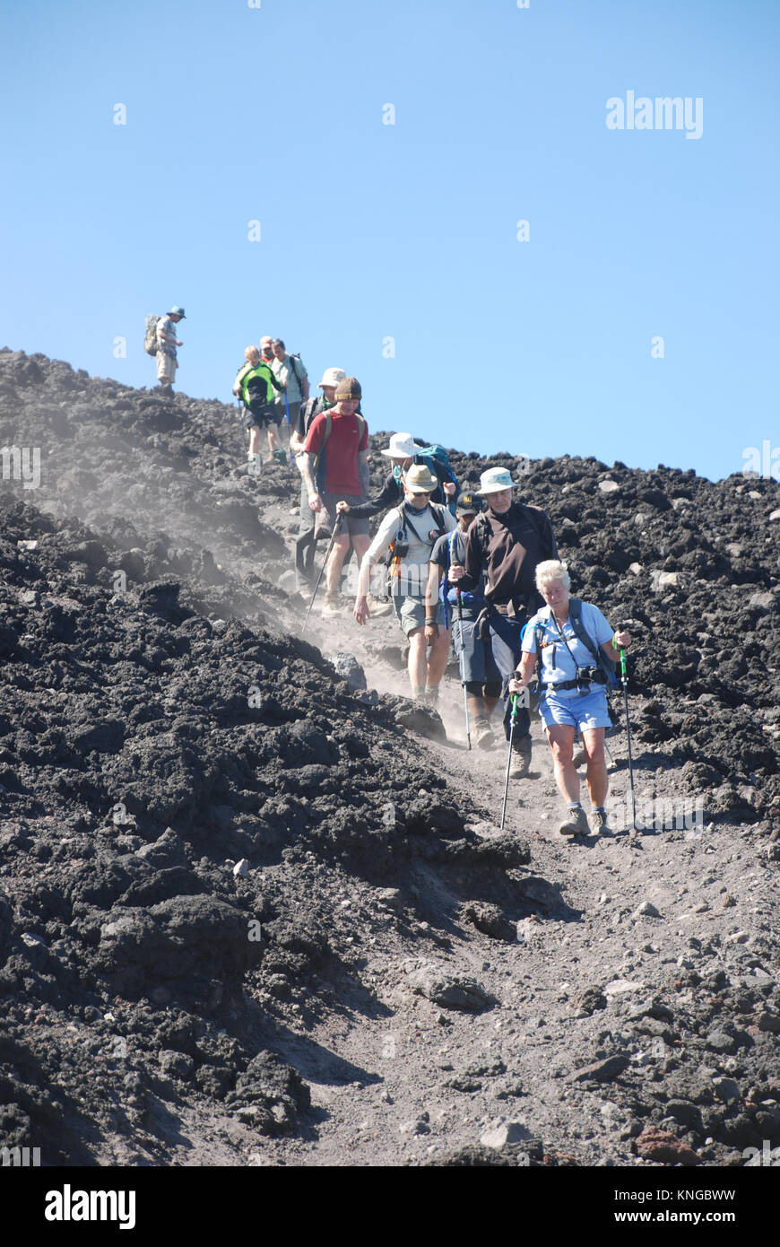 trekkers on the active volcano of Pacaya in Guatemala Stock Photo