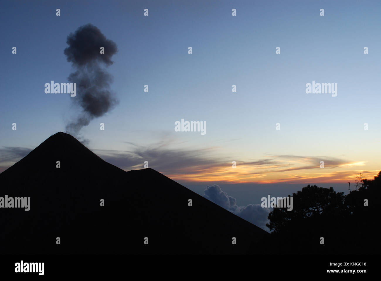 an eruption of Fuego volcano in Guatemala which is  the worlds most continuously active volcano Stock Photo