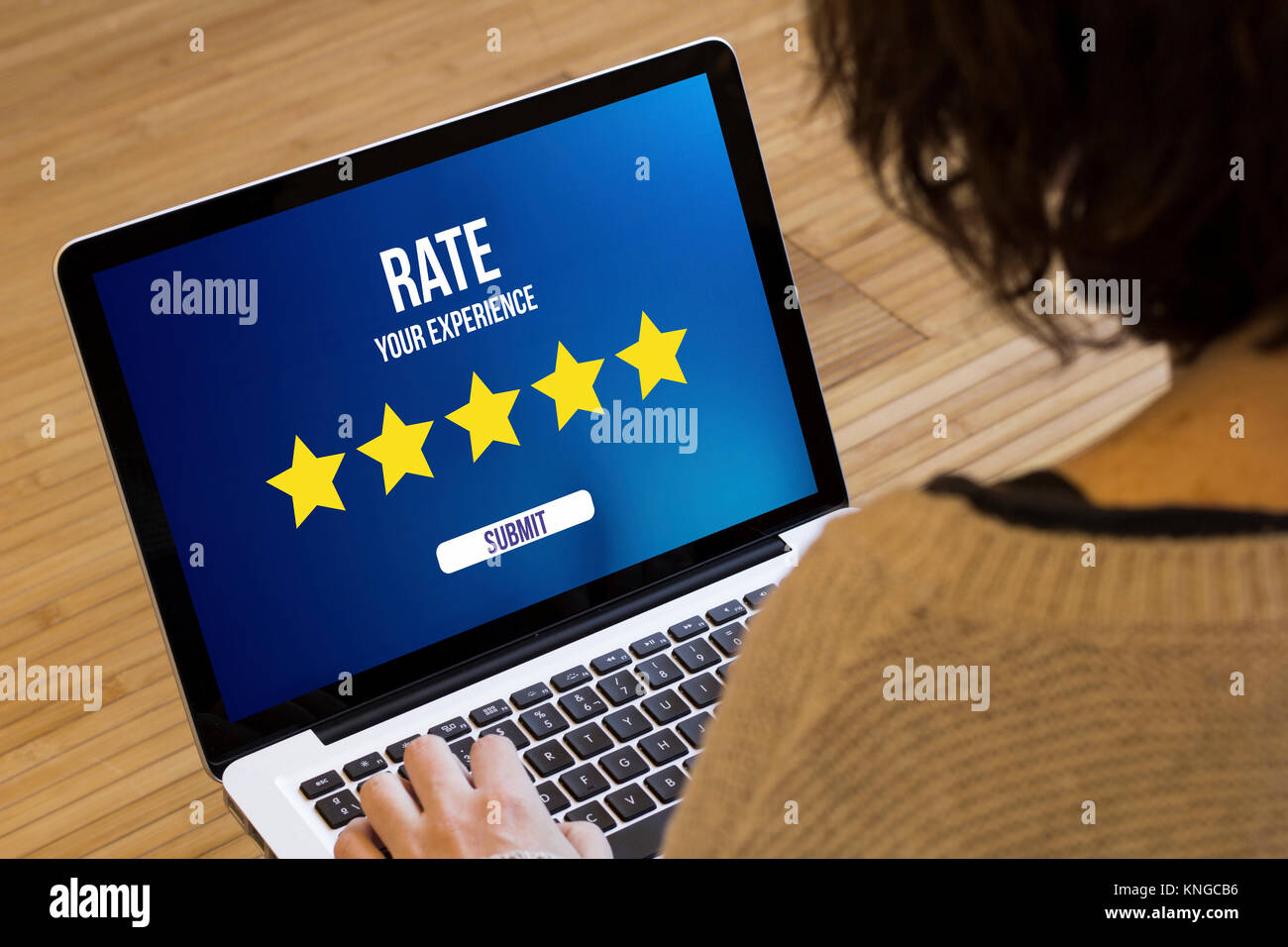 score online concept: rating online on a laptop screen. Screen graphics are made up. Stock Photo