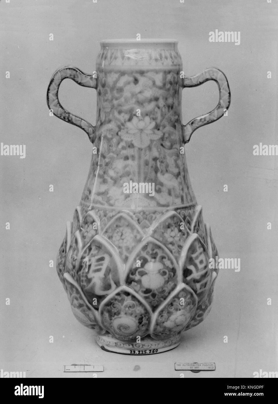 Vase. Period: Edo period (1615-1868); Date: 1800; Culture: Japan; Medium: White porcelain decorated with blue, the lower part modeled in high relief Stock Photo