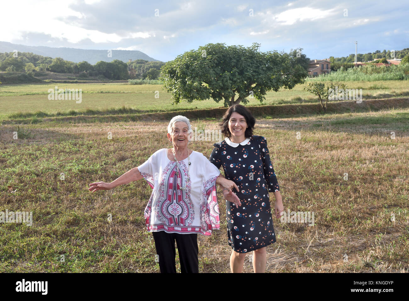 two happy women in the field Stock Photo - Alamy
