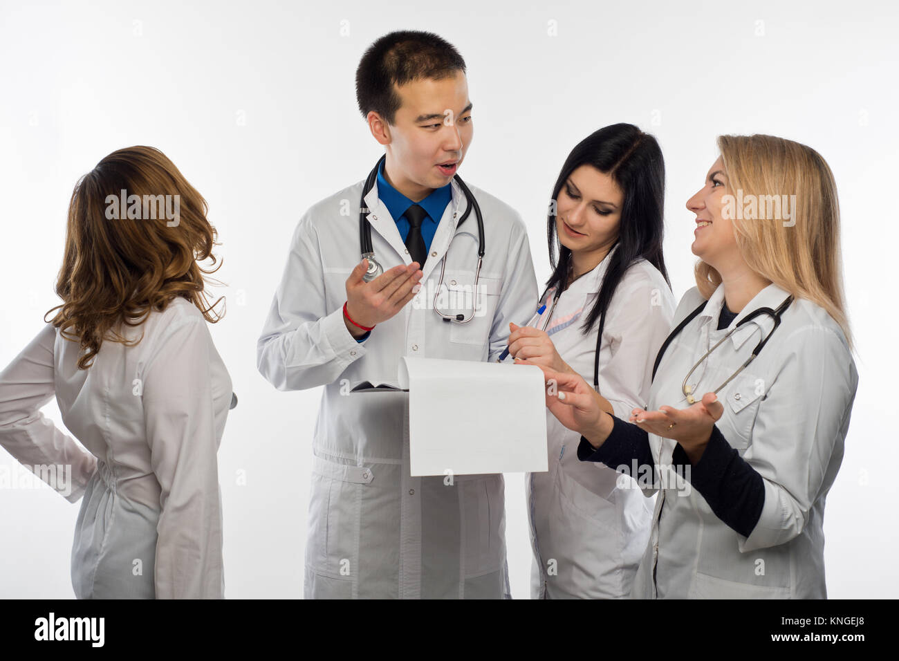 The mana doctor and three female doctors have fun discussing the test