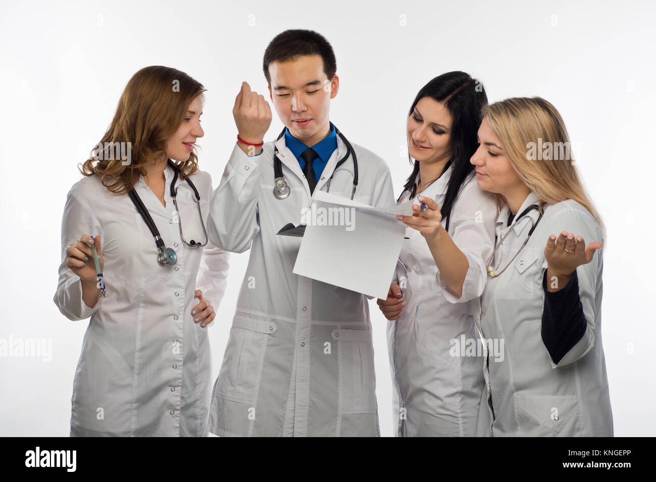 The mana doctor and three female doctors have fun discussing the test