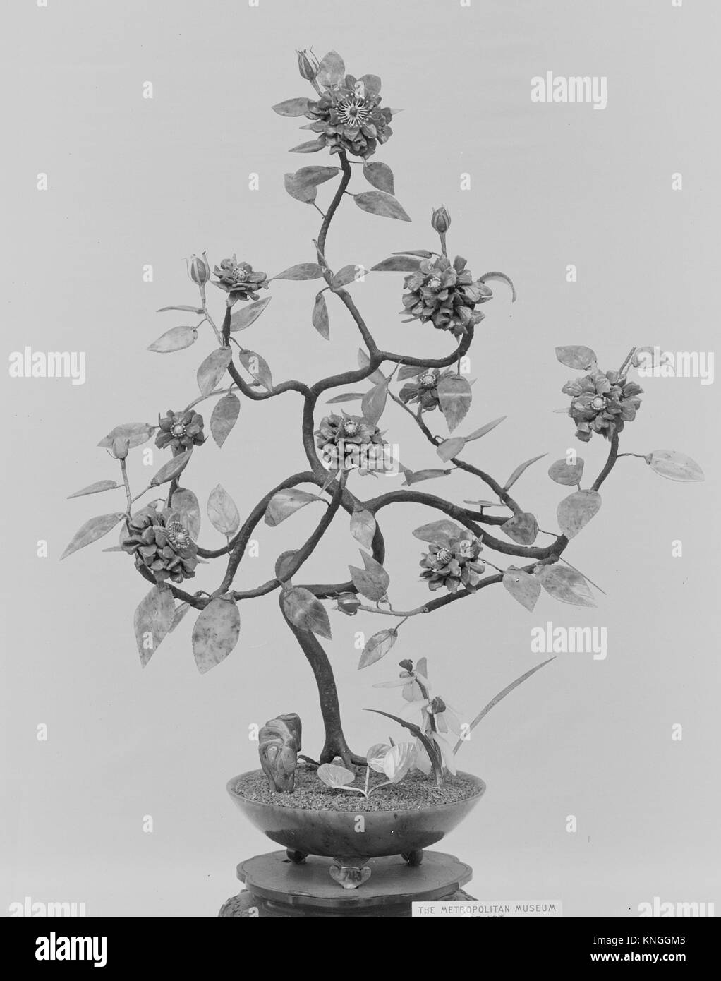 Bush. Period: Qing dynasty (1644-1911); Date: 19th century; Culture: China; Medium: Jade (nephrite); Dimensions: H. 17 in. (43.2 cm); W. 12 1/2 in. ( Stock Photo