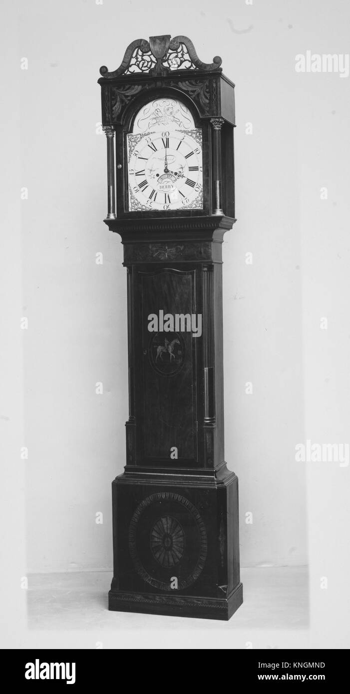 Longcase clock. Maker: Clockmaker: John Whitehurst (British, 1713-1788); Date: ca. 1780; Culture: British, Derby; Medium: Mahogany inlaid with Stock Photo