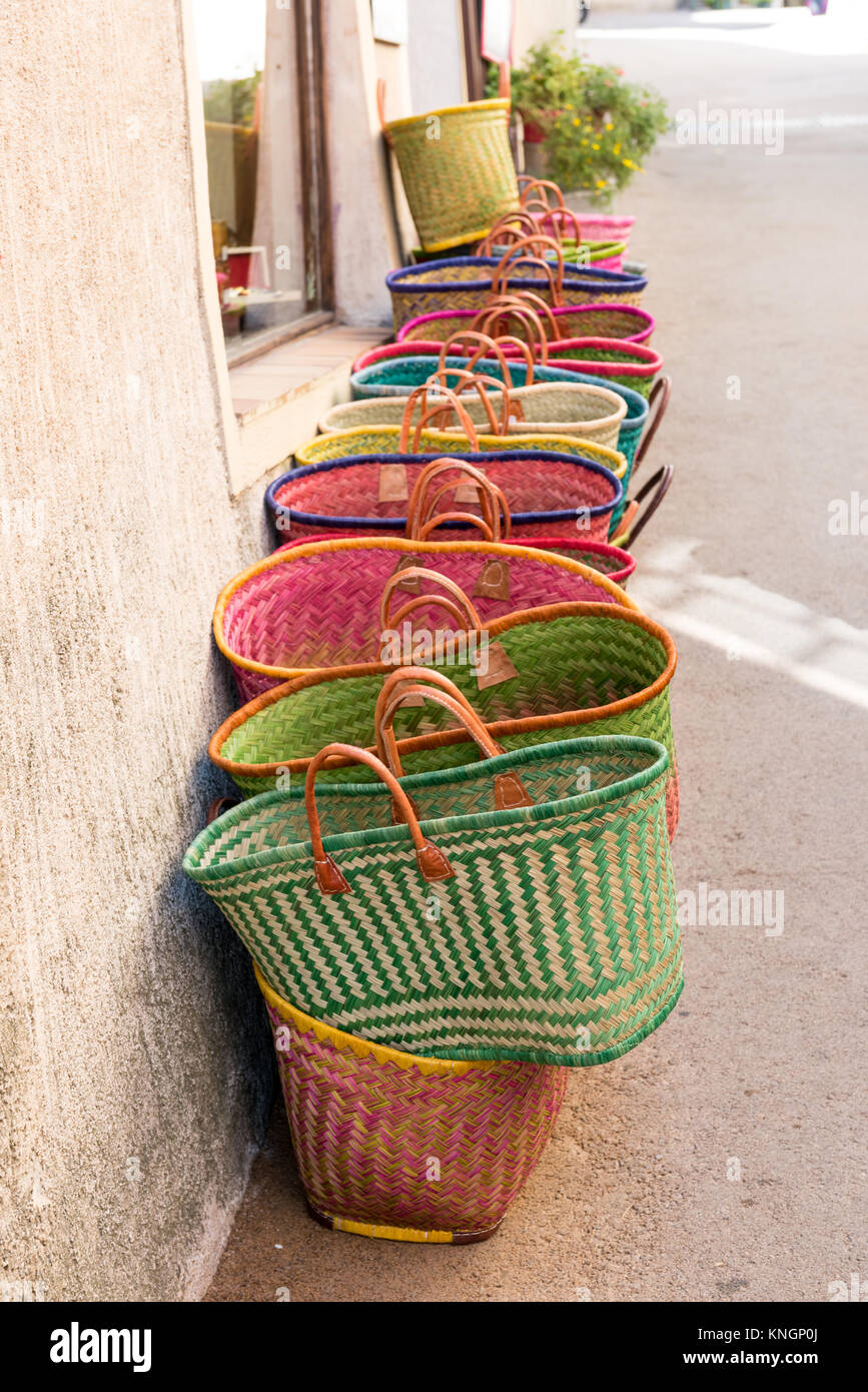 Colourful wicker baskets in a front of shop. France Stock Photo - Alamy