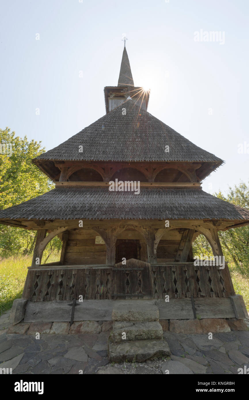 Frontal view of  the old wooden church in Barsana, Maramures, Romania. Stock Photo
