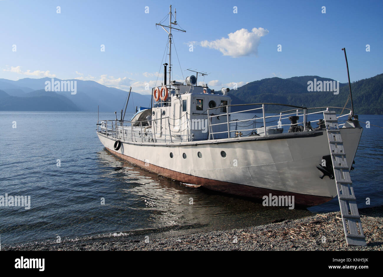 Siberia,lake Teletskoye. A boat on mooring Stock Photo