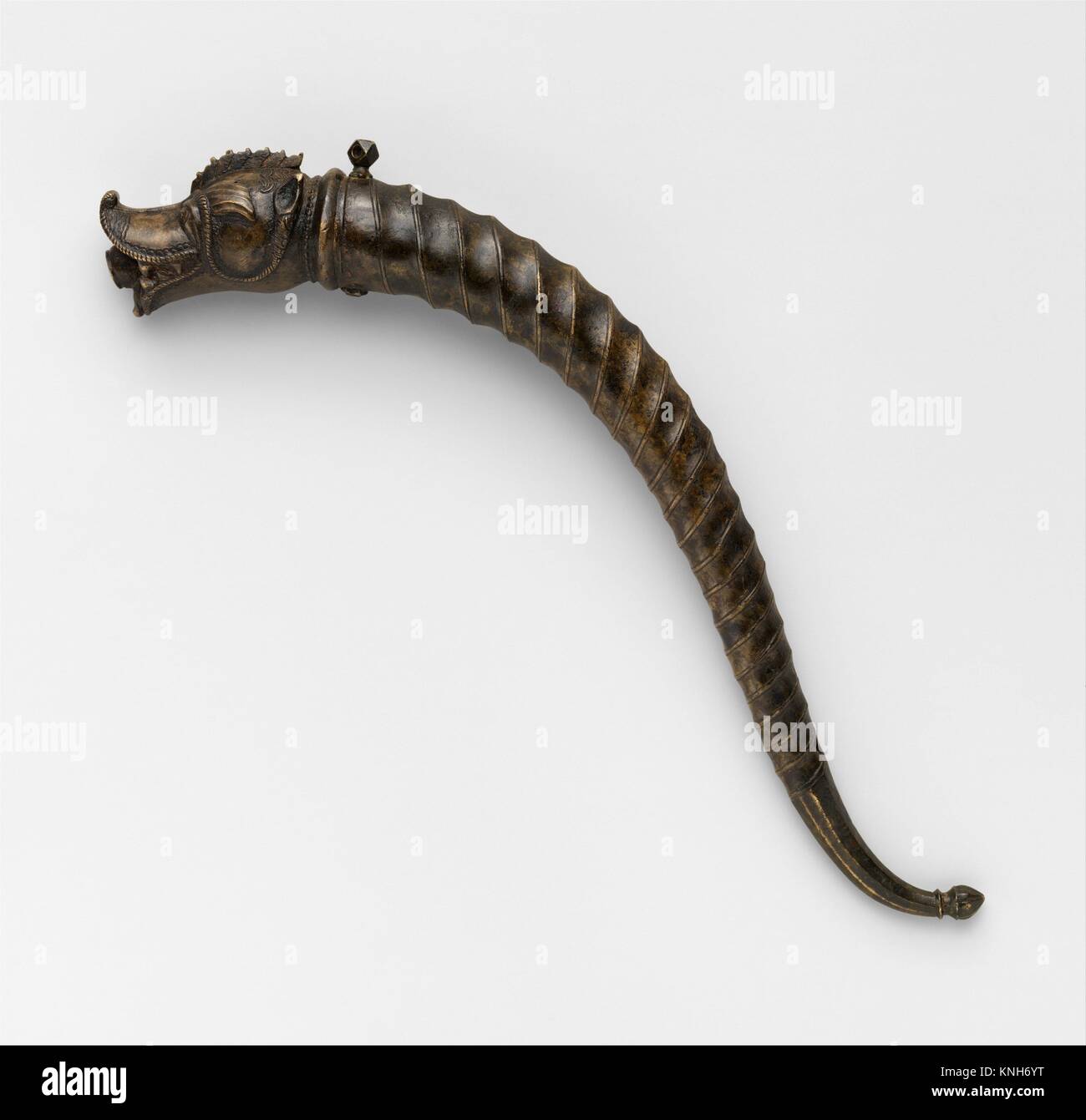 Primer. Date: 18th century; Geography: Rajasthan; Culture: Indian, Rajasthan; Medium: Brass; Dimensions: L. 10 1/2 in. (26.7 cm); D. 1 in. (2.5 cm); Stock Photo