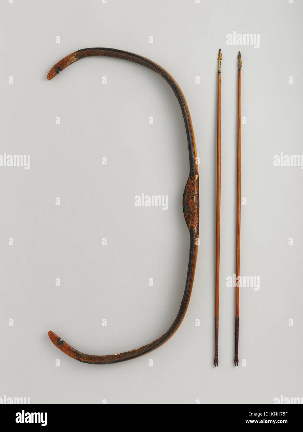 Composite Bow with Forty Arrows. Date: A.H. 1132/ A.D. 1719-20; Culture: Turkish; Medium: Horn, wood, pigment, sinew, paper?, lacquer, gold, silver, Stock Photo