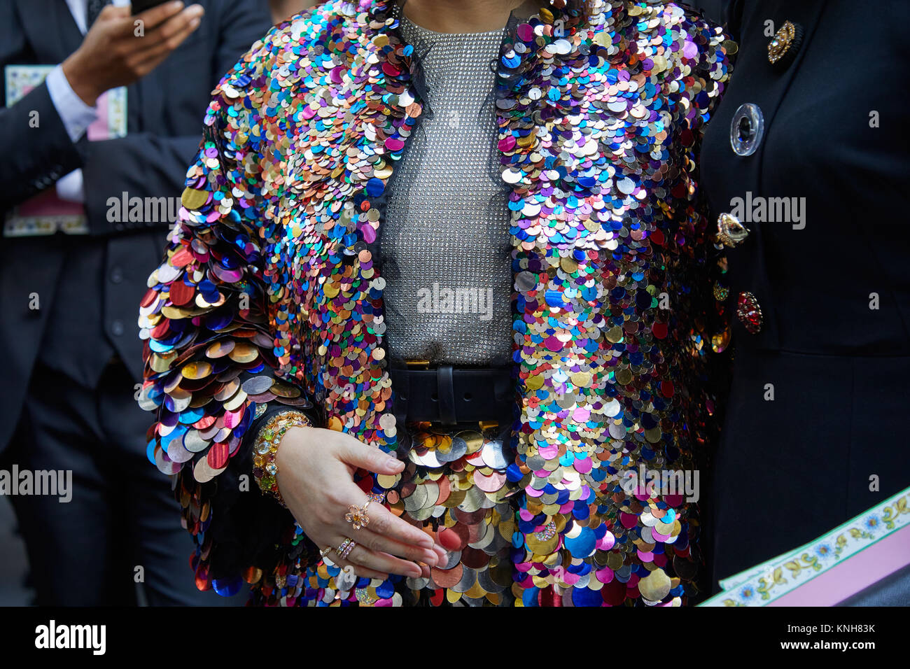 MILAN - SEPTEMBER 24: Woman with colorful sequin jacket and skirt before  Dolce and Gabbana fashion show, Milan Fashion Week street style on  September Stock Photo - Alamy