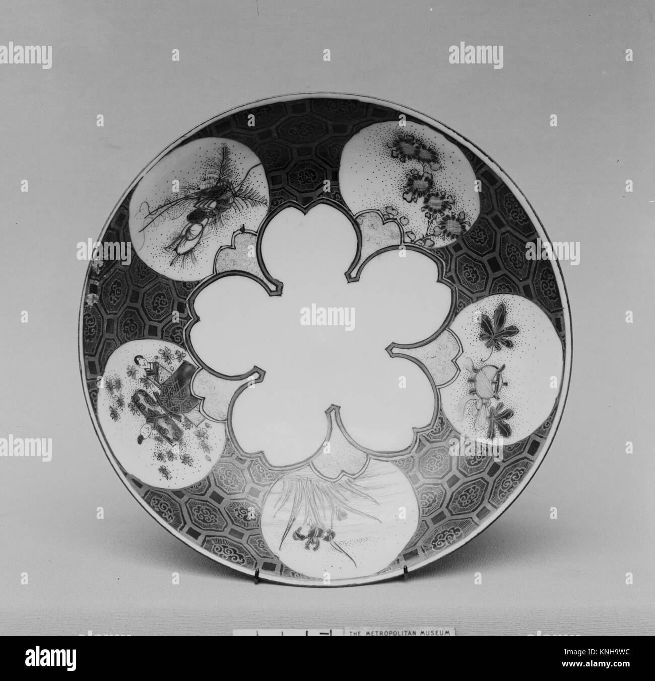 Saucer. Date 19th century; Culture Japan; Medium White porcelain decorated with red and gold
