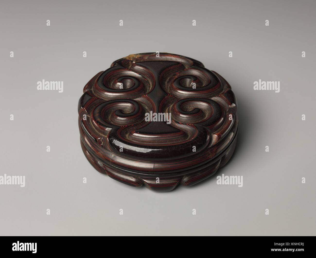 Box with ´Pommel Scroll´ Design. Period: Yuan dynasty (1271-1368); Date: 14th century; Culture: China; Medium: Carved red, black, and yellow lacquer; Stock Photo