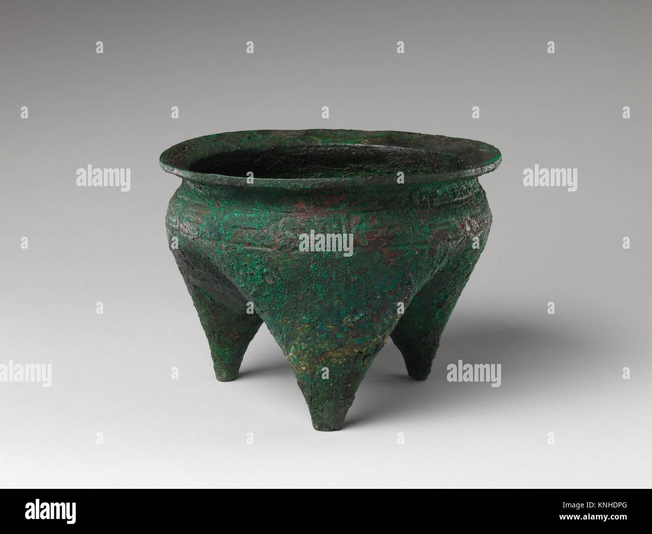 Food Vessel (Li). Period: early Shang dynasty (ca. 1600-1046 B.C.); Culture: China; Medium: Bronze; Dimensions: H. 5 3/4 in. (14.6 cm); Diam. 7 7/8 Stock Photo
