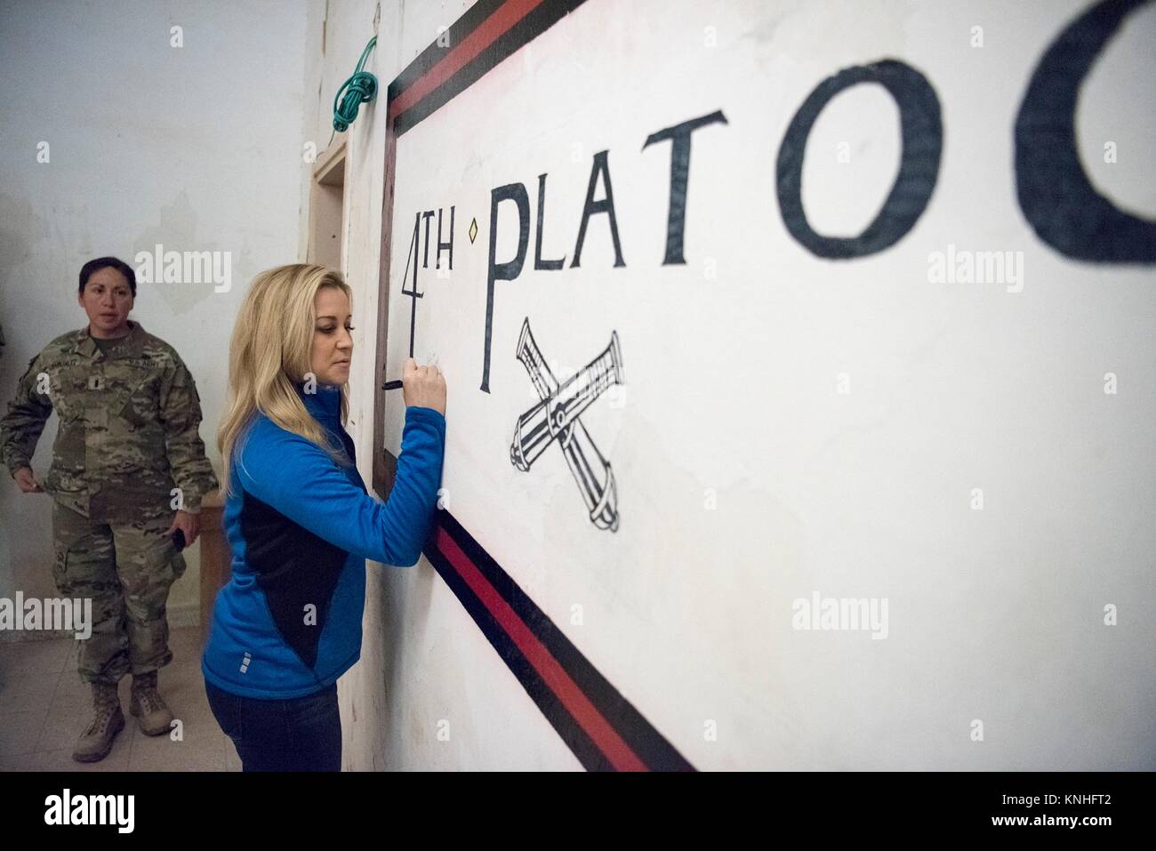 Country music singer Kellie Pickler signs her autograph while visiting U.S. soldiers for the CJCS USO Holiday Tour December 25, 2016 in Iraq.  (photo by PO2 Dominique A. Pineiro  via Planetpix) Stock Photo
