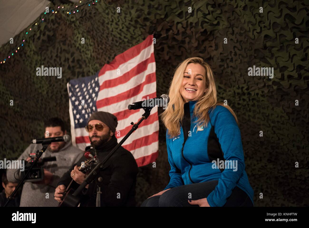 Guitarist Dave Baker and country music singer Kellie Pickler perform for U.S. troops during the CJCS USO Holiday Tour December 25, 2016 in Iraq. (photo by PO2 Dominique A. Pineiro  via Planetpix) Stock Photo