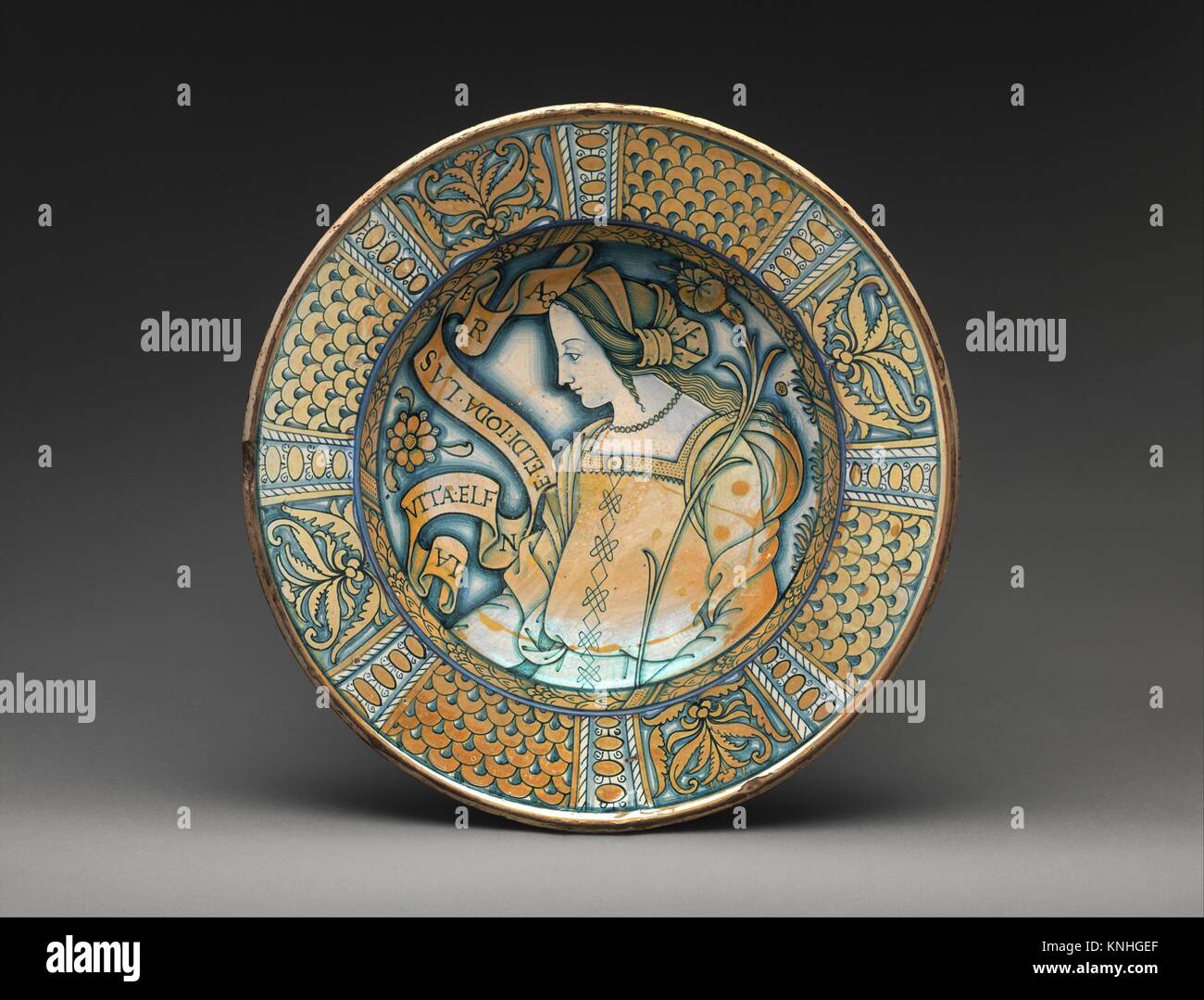 Dish with profile of a woman with Petrarchan verse. Date: ca. 1510-30; Culture: Italian, Deruta; Medium: Maiolica (tin-glazed earthenware), lustered; Stock Photo