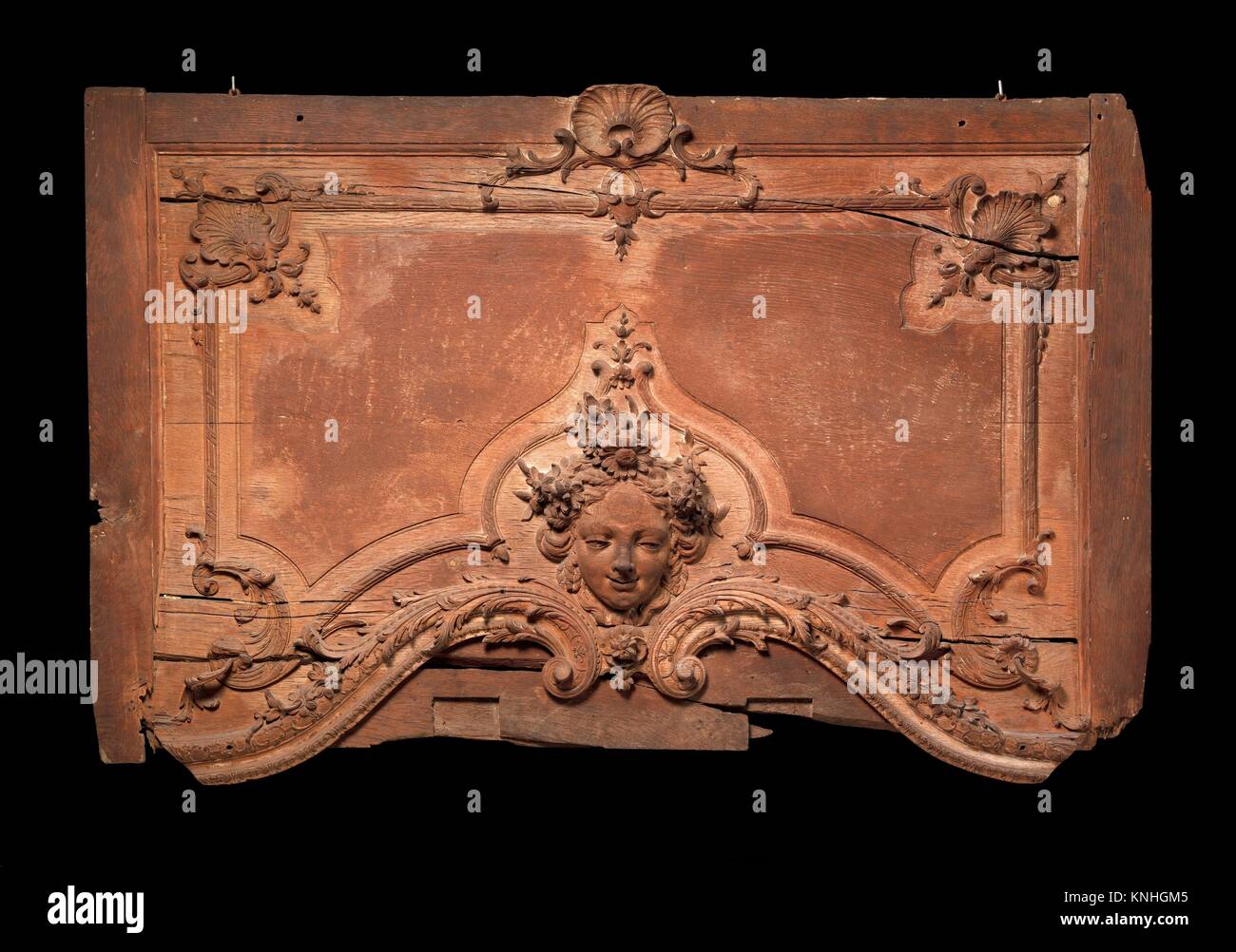 Panel from the top of a mirror frame. Date: 18th century; Culture: French; Medium: Oak; Dimensions: Overall, approximate depth (confirmed): 35 1/2 x Stock Photo