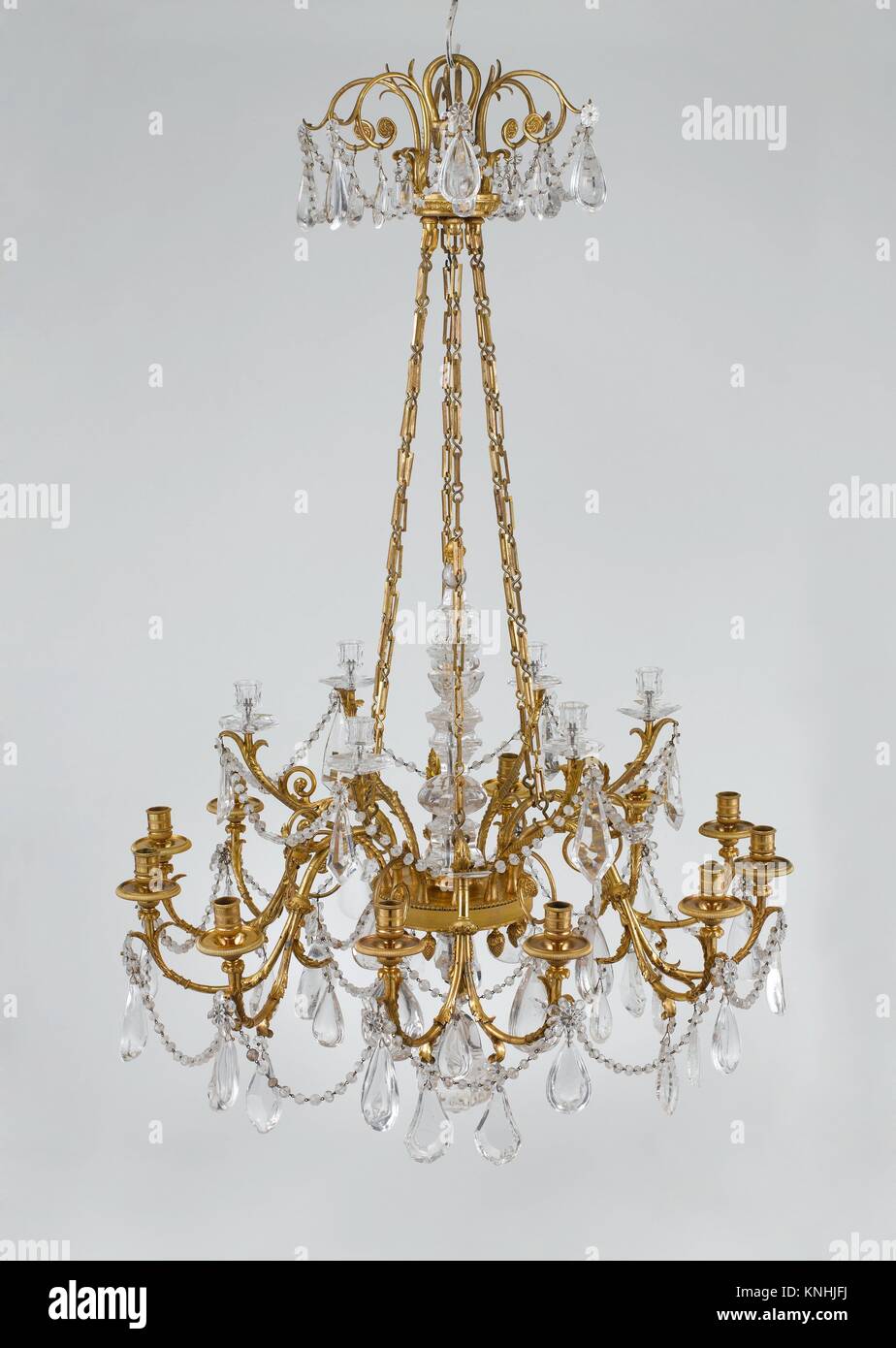 Eighteen-light chandelier. Date: ca. 1790; Culture: French; Medium: Gilt bronze, rock crystal; Dimensions: Height: 58 in. (147.3 cm); Diameter: 37 Stock Photo