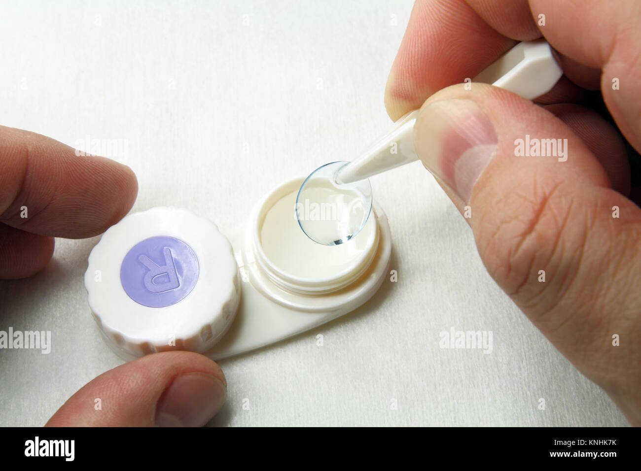 Careful handling of soft contact lenses Stock Photo Alamy