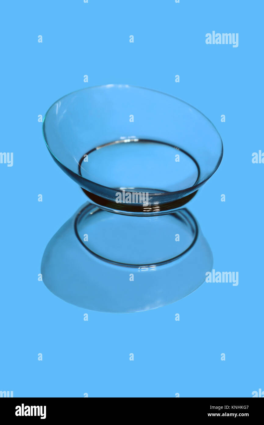 Soft contact lens on the reflecting surface Stock Photo