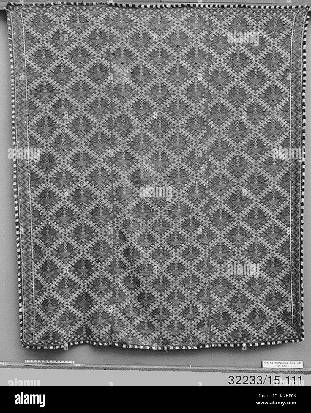 Historical Textiled Patterns This bedspread is a textile artifact showcasing intricate patterns and ...