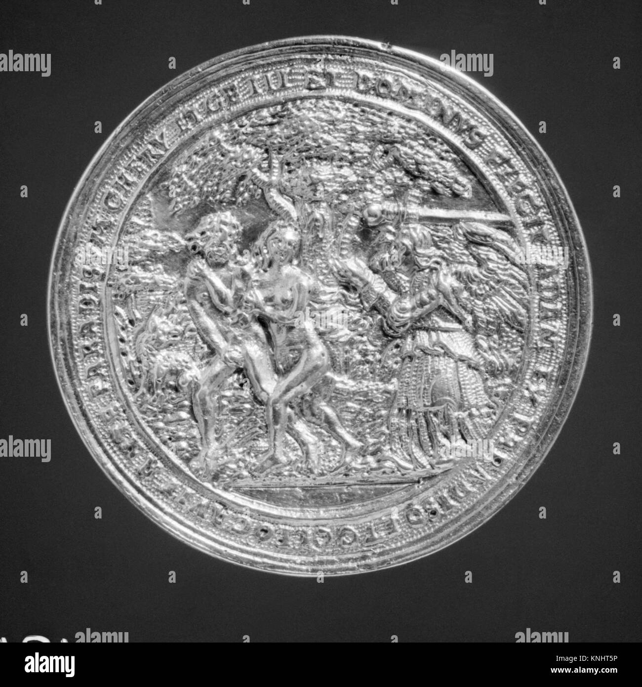 This artwork depicts Adam and Eve in the Garden of Paradise ...