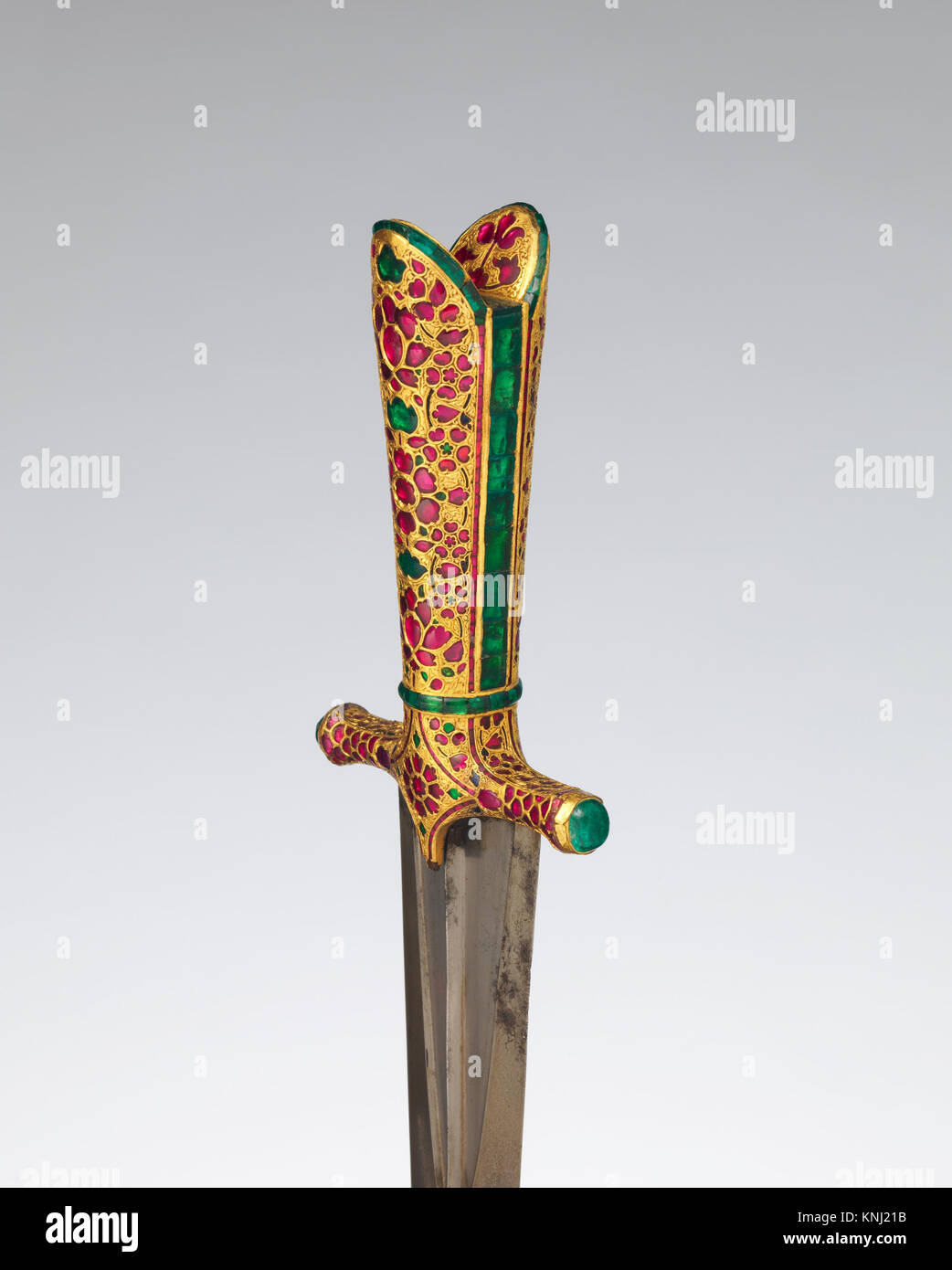 This dagger is accompanied by a scabbard, highlighting the importance ...